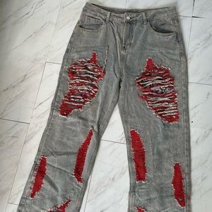 Distressed denim jeans runs small fits medium -large